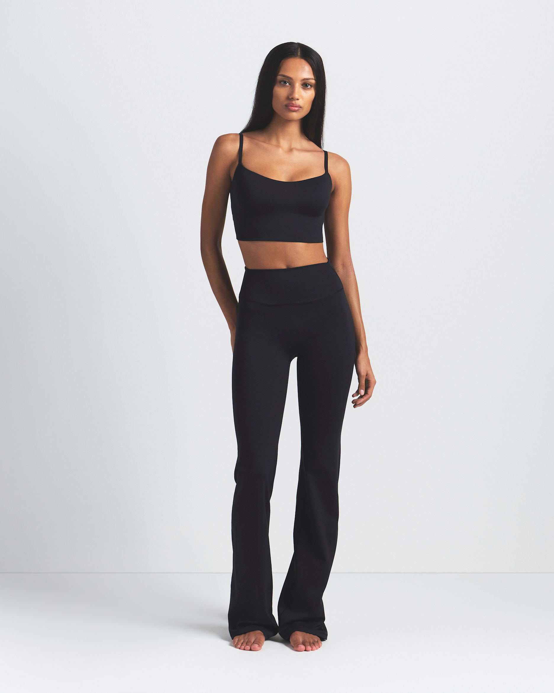 NikeSKIMS Matte Women's High-Waisted Slim Flared Leggings. Nike.com